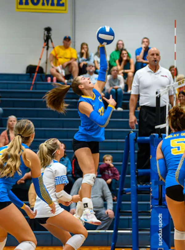 Emma Keeping at the net, Imlay City Volleyball