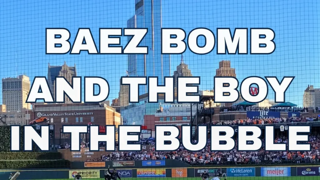 Baseball game with city skyline backdrop