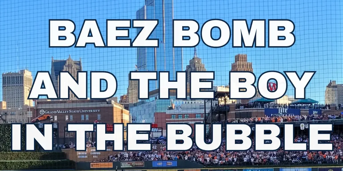 Baseball game with city skyline backdrop