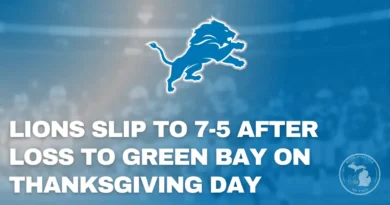 Alt Image Text: Detroit Lions and Green Bay Packers in action at Ford Field on Thanksgiving Day as Lions fall to 7–5.