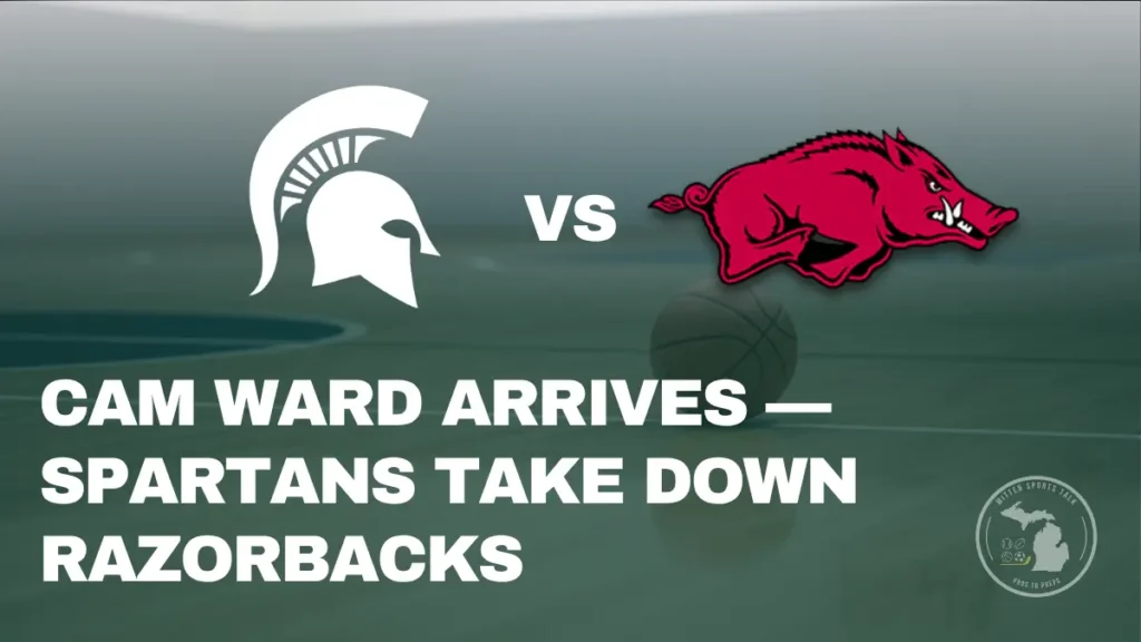 Freshman Cam Ward of Michigan State shoots a layup against Arkansas defenders during a packed game at the Breslin Center.