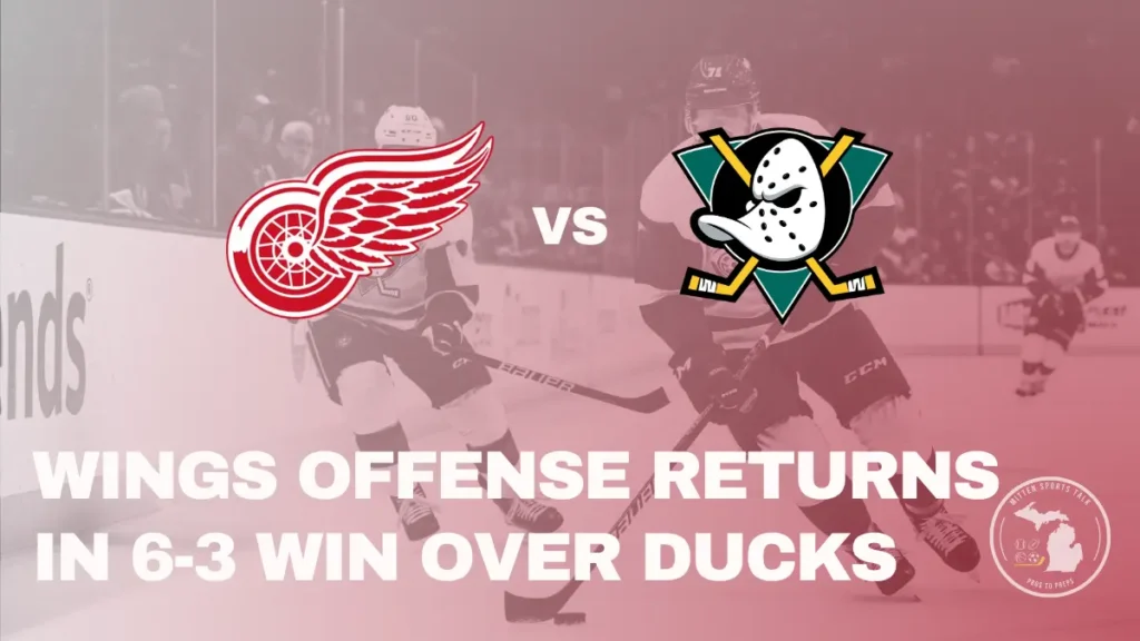 Red Wings beat Ducks 6-3. Photo of players on ice at Little Ceasars Arena