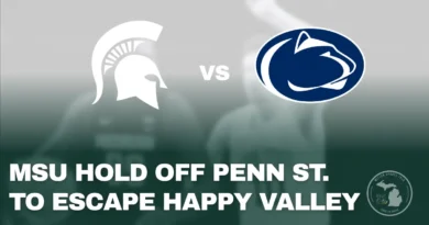 Michigan State Spartans celebrate a road win against Penn State at the Bryce Jordan Center