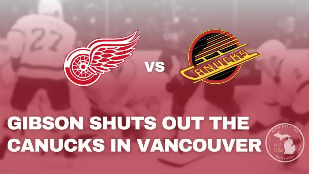 John Gibson makes a glove save during his 39-save shutout against the Vancouver Canucks.