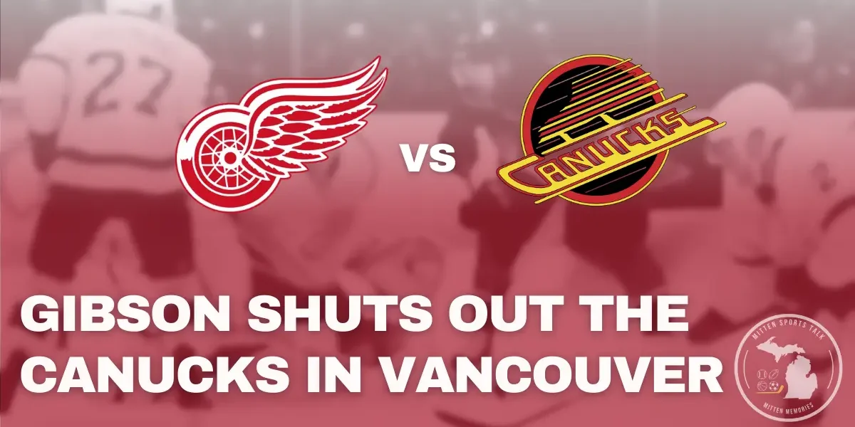 John Gibson makes a glove save during his 39-save shutout against the Vancouver Canucks.