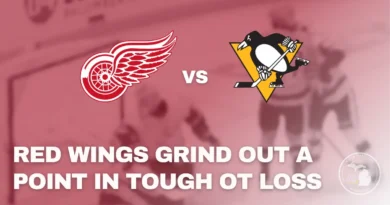 Detroit Red Wings players celebrate during a road game against the Pittsburgh Penguins in a New Year’s Day NHL matchup.