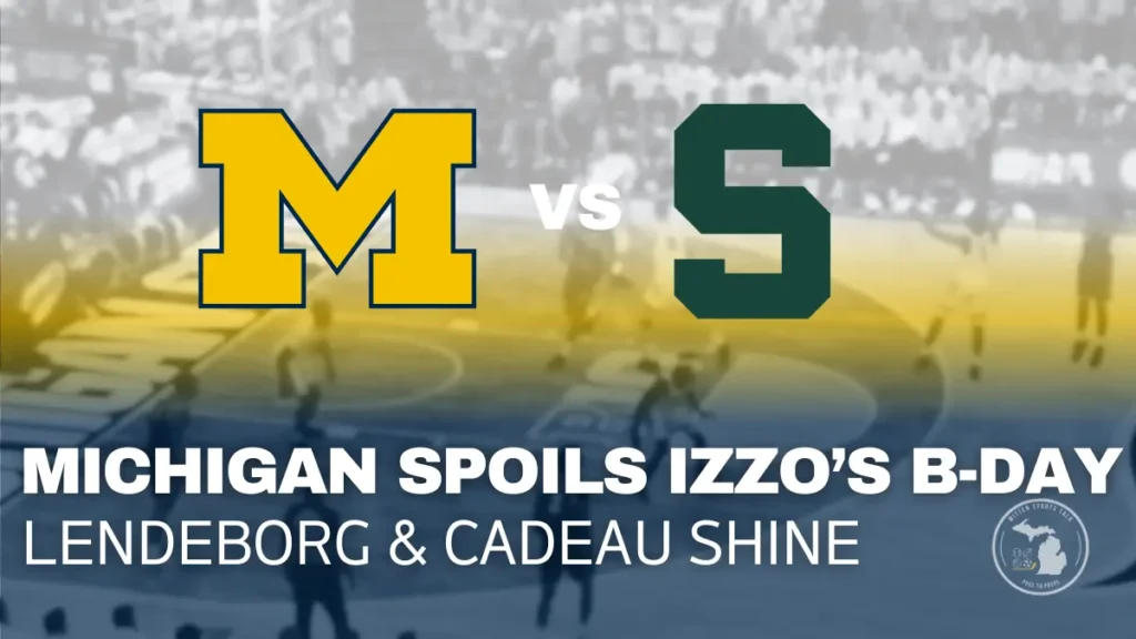 Michigan Wolverines players celebrate after an 83–71 road win over Michigan State at Breslin Center, spoiling Tom Izzo’s birthday in a Big Ten rivalry game.