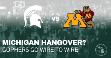 Fans storm the court after Michigan State loss against Minnesota
