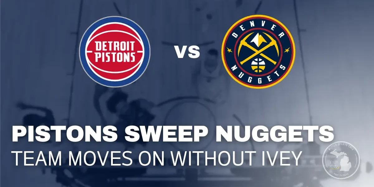 Cade Cunningham driving to the basket against the Denver Nuggets defense.